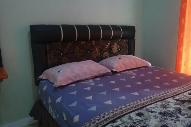 OYO 3304 Garuda Guest House - Photo2