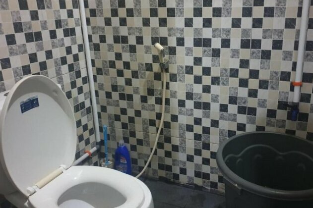 OYO 3304 Garuda Guest House - Photo4