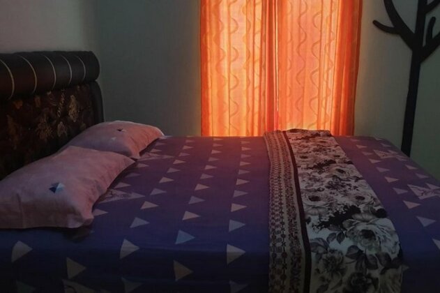 OYO 3304 Garuda Guest House - Photo5