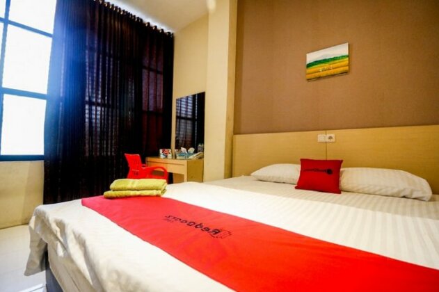RedDoorz Pasar Tarapung Siring - Photo2