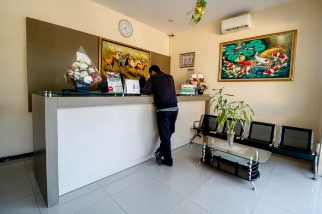 RedDoorz Pasar Tarapung Siring - Photo4