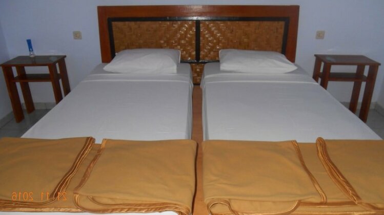The Local Menjangan Homestay - Photo4
