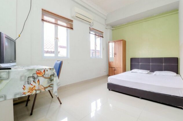 Tachi Stay Guesthouse Syariah - Photo2