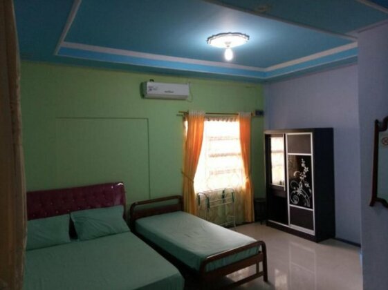 Tachi Stay Guesthouse Syariah - Photo5