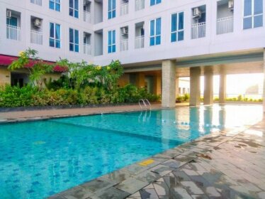 Comfortable Studio Grand Dhika City Apartment By Travelio