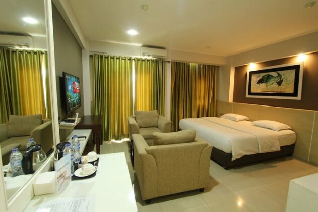 Fastrooms Bekasi Hotel - Photo2