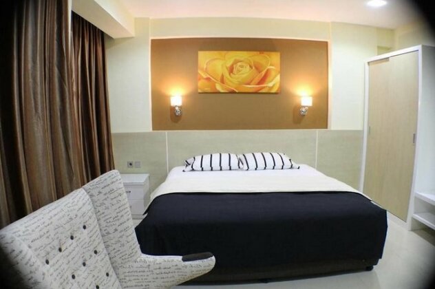 Fastrooms Bekasi Hotel - Photo4