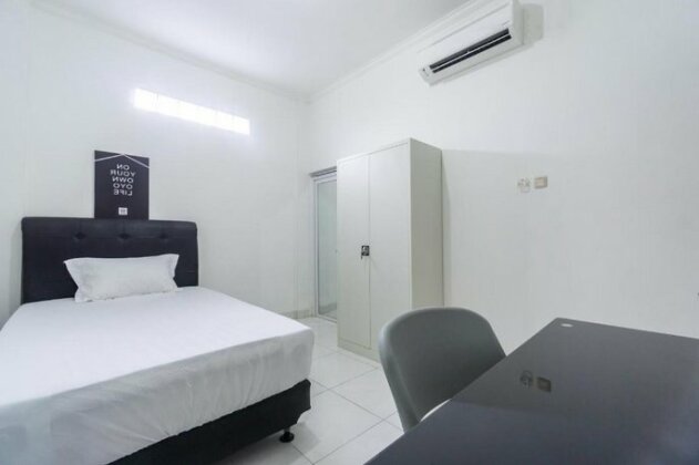 Oyo 2863 Rumah Q - Photo4