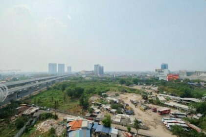 Pool View 2BR Apartment @ Mutiara Bekasi By Travelio