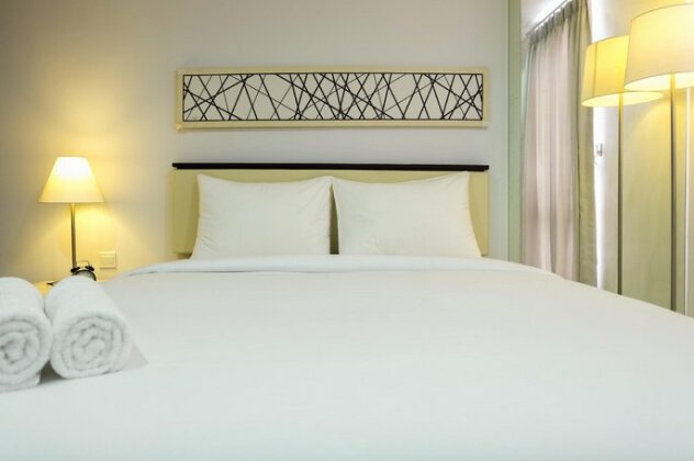 Studio Room Azalea Suites Apartment By Travelio - Photo2