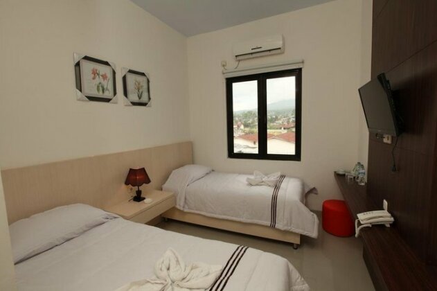 Hotel Summer Bitung - Photo4
