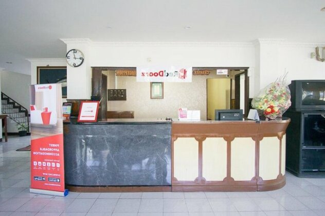 RedDoorz plus near Pelabuhan Bitung - Photo4