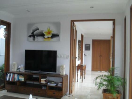 Coconuts Guesthouse Canggu - Photo4