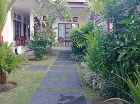 Purnama Guesthouse - Photo2