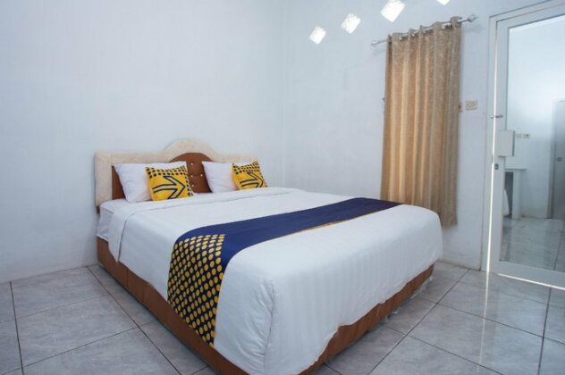 SPOT ON 3119 Hotel Kurnia - Photo2