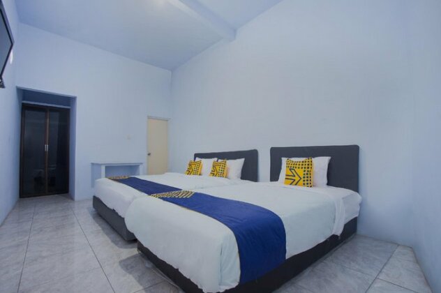 SPOT ON 3119 Hotel Kurnia - Photo4