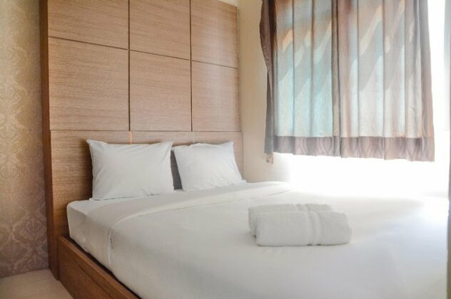 2br Grand Emerald Apartment By Travelio - Photo2