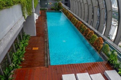 Affordable 2BR At L'Avenue Apartment By Travelio