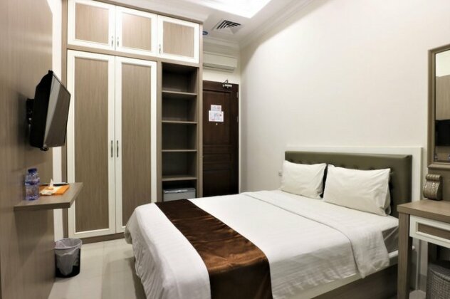 Alivio Suites Kuningan - Photo2