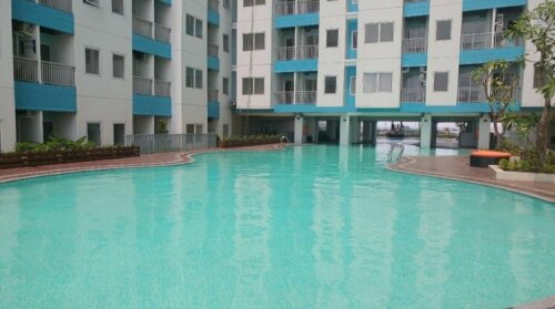 Brand New Compact Studio The Nest Puri Apartment By Travelio
