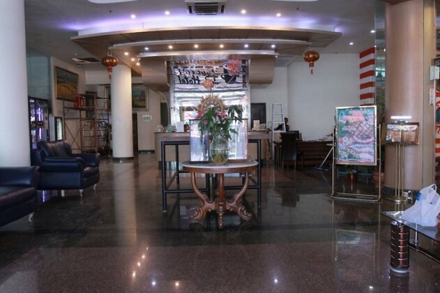 Capital O Business Hotel - Photo4