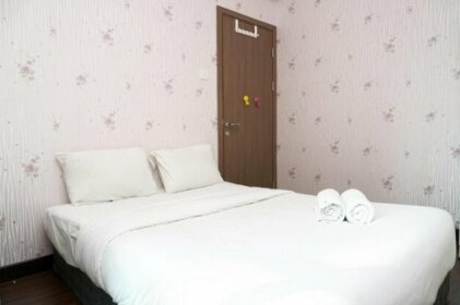 Comfy 2BR Puri Orchard Apartment By Travelio