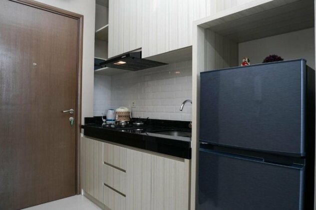 Comfy Studio Ciputra Internasional Apartment By Travelio - Photo2