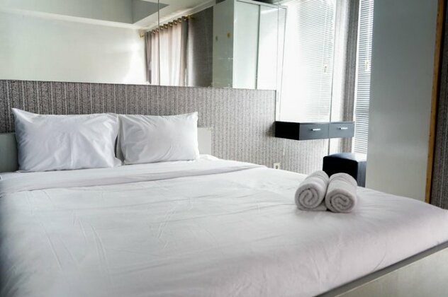 Comfy Studio Grand Kartini Apartment By Travelio - Photo2