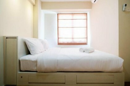 Connect to Pool 2BR Apartment at Bassura City By Travelio