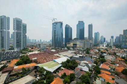 Cozy 1BR Tamansari Semanggi Apartment By Travelio