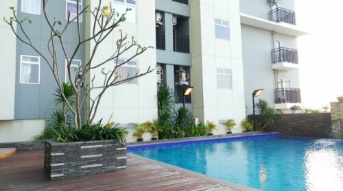 Cozy Studio Gading Greenhill By Travelio