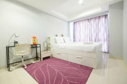 Elegant 1BR The Mansion Apartment near Kemayoran By Travelio