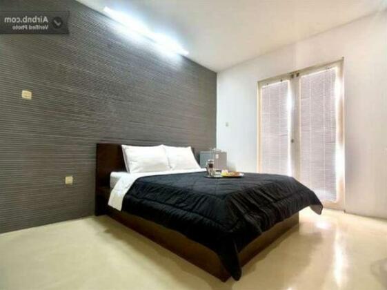 FLAT06 Minimalist Residence - Photo2