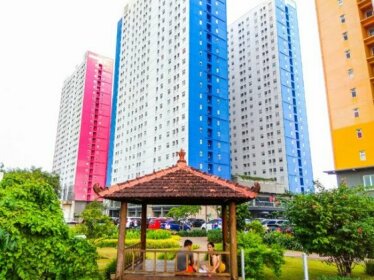 Homey 2BR @Green Pramuka Apartment By Travelio