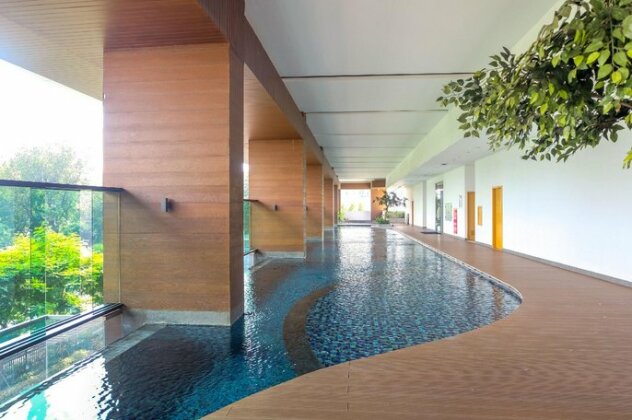 Homey Studio Room at Capitol Suites By Travelio - Photo3
