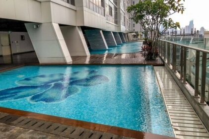 Luminous Modern 2 BR Menteng Park Apartment By Travelio