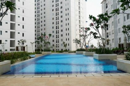Minimalist Studio Room Bassura City Apartment By Travelio
