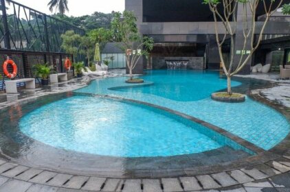 Modern and Homey 1BR L Avenue Pancoran Apt By Travelio