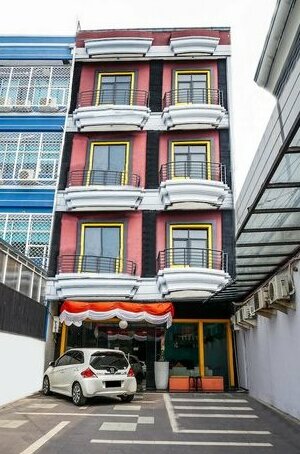 OYO 119 Belvena Hotel