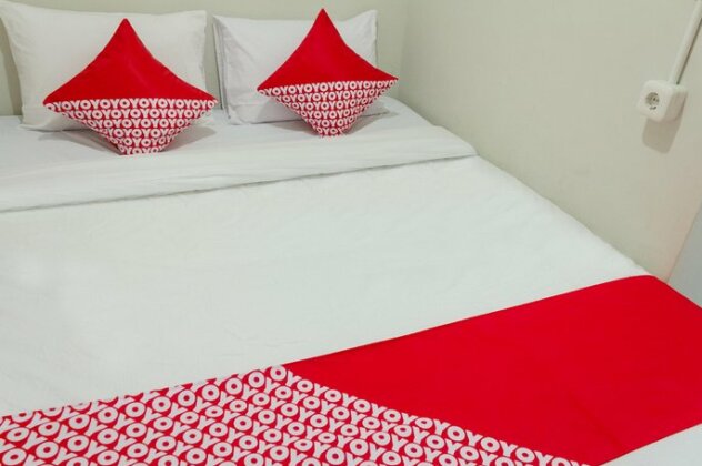 OYO 737 Kamar keluarga mahkota 8 - Photo5