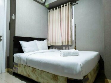 Pool View 2BR Green Pramuka Apartment near Shopping Mall By Travelio