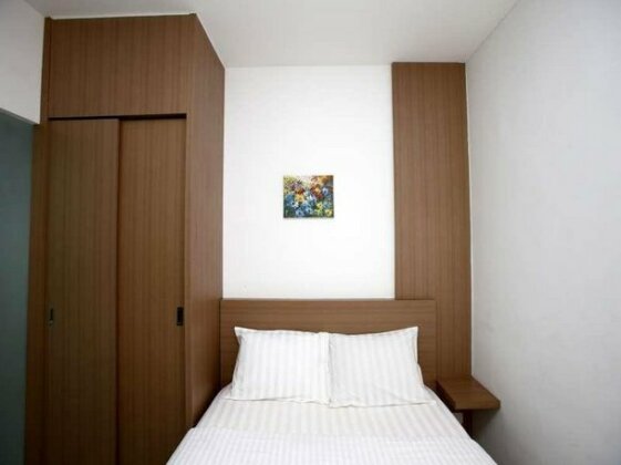 RedDoorz UOB Plaza - Photo5