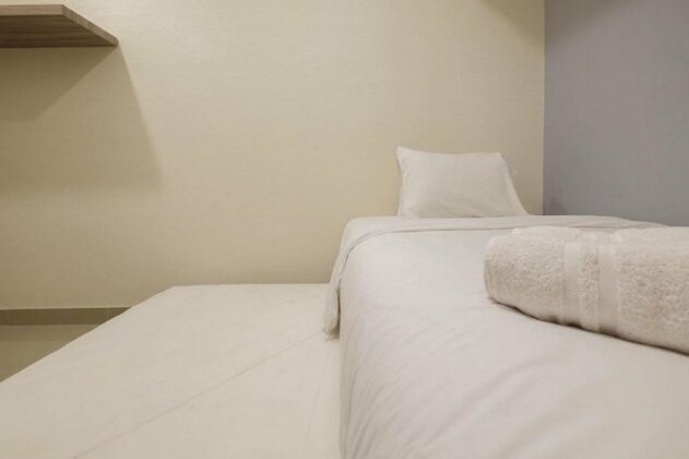 Relaxing 2BR Apartment Royal Olive Residence By Travelio - Photo4