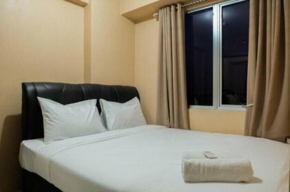 Simple and Modern 2BR Bassura City Apartment By Travelio