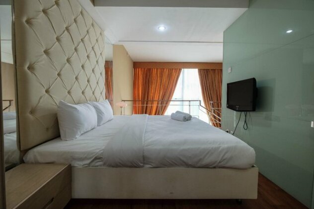 Spacious 1BR Two-Level Apartment at CityLofts Sudirman By Travelio - Photo2