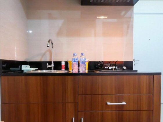 Studio Green Pramuka City Apartment with Mall Access By Travelio - Photo3