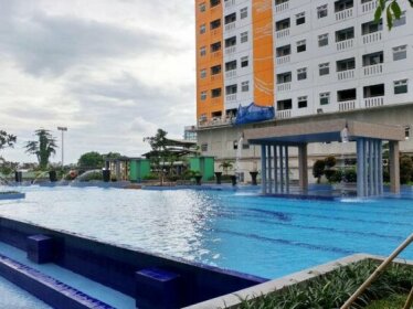 Studio Green Pramuka City Apartment with Mall Access By Travelio