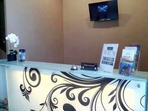 The Gloria Suites Grogol - Photo3