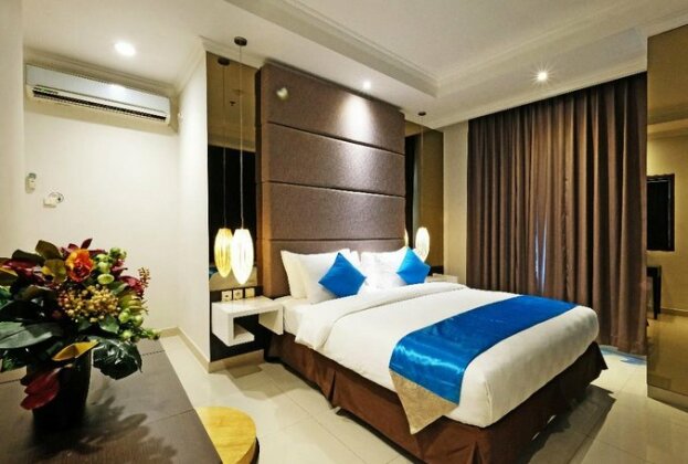 The Louvre Bellezza Suites - Photo3