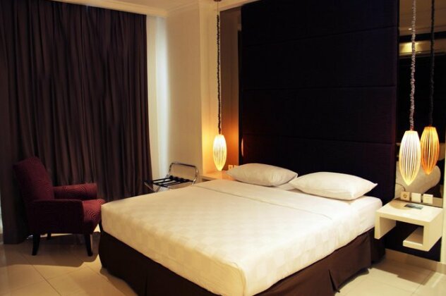 The Louvre Bellezza Suites - Photo4